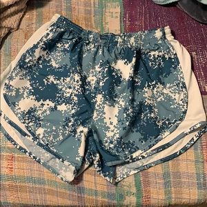 Blue and grey nike running shorts